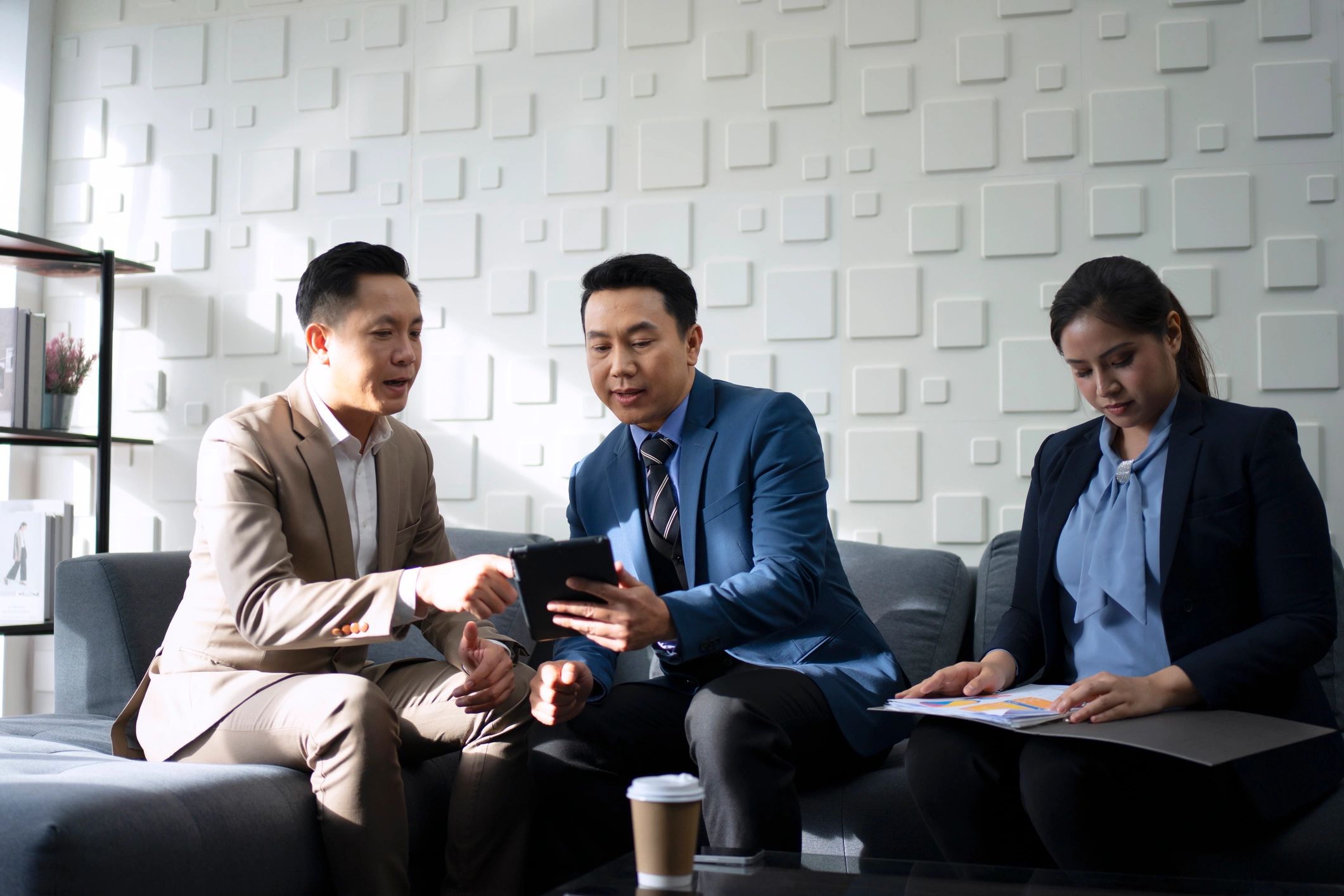 Professional office meeting focused on financial review and compliance planning